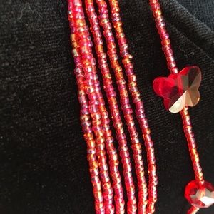 38” Red Crystals. Pinkish Iridescent